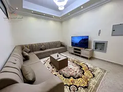 Furnished two-bedroom apartment with a living room in Al Rawda 3, fully ready for occupancy.