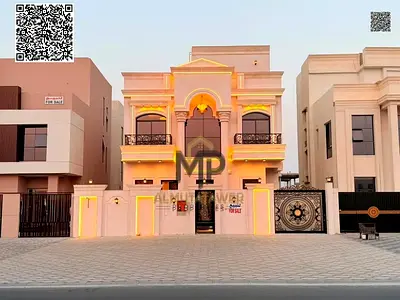 A luxurious classic-style villa in Al Helio 2, situated on a main road. It features a 15-meter front setback that provides extra privacy and space, an