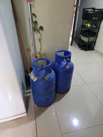 Two blue LPG gas cylinders - used, good condition