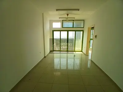 Writing Spacious 1BHK with 2 Balconies | Roadside Building | Sheikh Hamad Bin Abdullah Road | AED 19,000 With out Ac