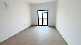 1Annual rental in the Al-Aliya area of Ajman: 2 bedrooms and a living room. Prime location wit
