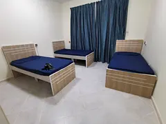 Fully furnished execute bed space available in Dubai al Nada 2 near NMC hospital