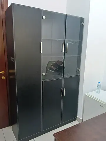 Tall Black Display Cabinet with Glass Doors - Good Condition