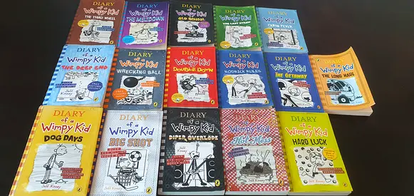 Diary of a Wimpy Kid book collection (paperback and one hardback) - multiple titles 15 for each