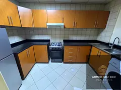 A beautiful, high-end, fully furnished one-bedroom and living room unit for annual rent at Ajman One