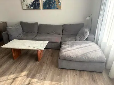 Looks Like a new Pan Emirates Pianca Corner feather filled sofa with footstool