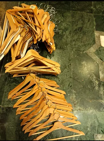 Bundle of wooden clothes hangers - around 85 pieces