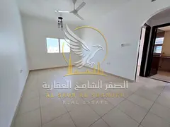 One-bedroom apartment with a living room available for annual rent in Al Qulai'ah; features high-end