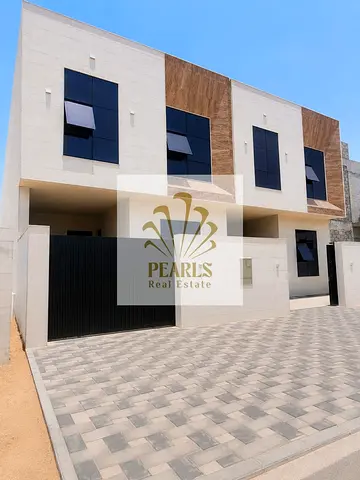 Townhouse for rent in Al Helio, Ajman, 5 bedrooms, majlis, hall, yard, fitted wardrobes and equipped kitchen, near Safeer Market & MBZ Road. AED100k/4