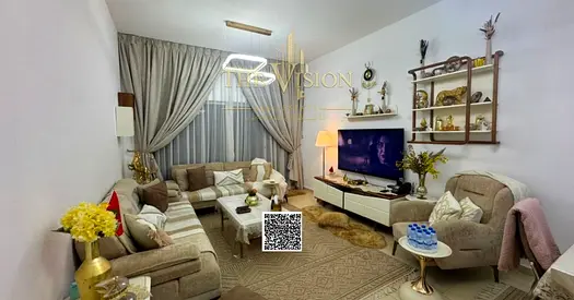 Spacious 2-bedroom apartment with a living room; available with a down payment of AED 264,741 and monthly installments.