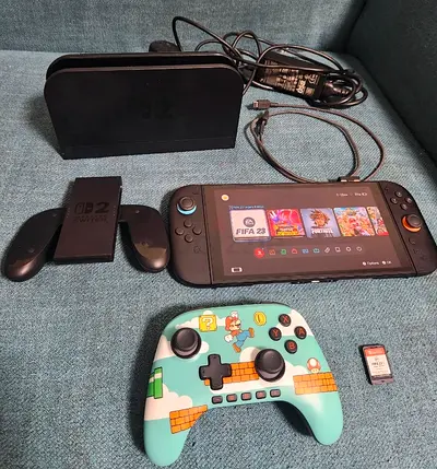 Nintendo Switch 2 with FC23 game and original controller