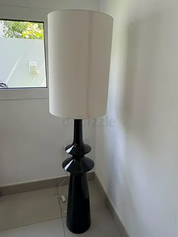 Tall black ceramic floor lamp with white drum shade - modern design