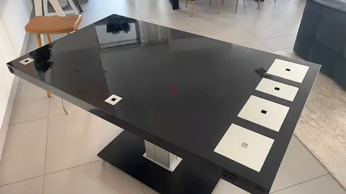 Electric Ascending / Descending table made by MILK Furniture Denmark