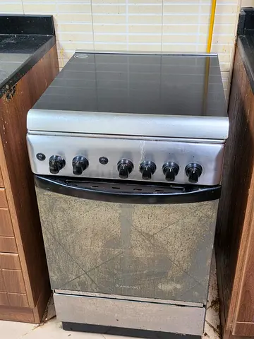 Used standalone electric/ceramic top cooker with oven - needs cleaning