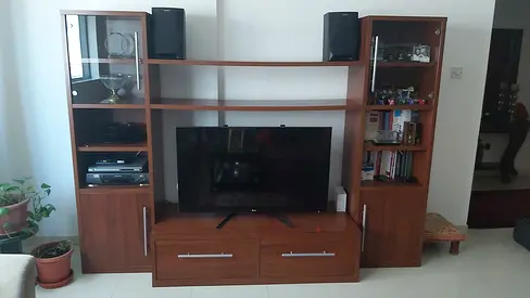 Wooden entertainment center with shelving and TV stand - good condition