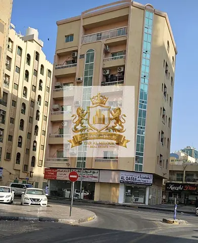 Building for sale in Sharjah... Al Rolla area... Land area: 2,000 sq. ft. Ground floor + 6 upper floors... Comprising: 3 commercial shops 15 one-bedro