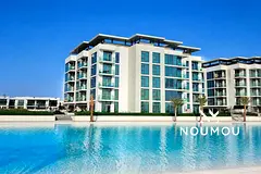 Corner unit | Lagoon and Meydan hotel view