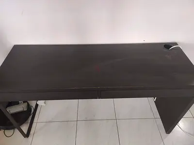 Black colour office desk and rolling chair for sale in Al Qusais 1, Dubai