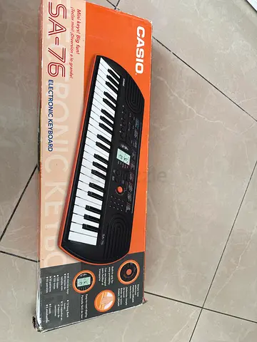 Electronic Keyboard in Box