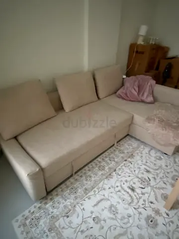 Light beige L-shaped sofa - good condition, comfortable seating