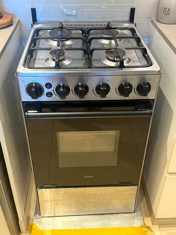 Midea 4-Burner Gas Cooker with Oven - Good Working Condition