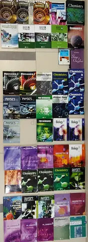 Mixed collection of university/college science and economics textbooks - good used condition
