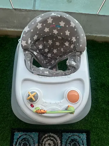 Urgent sale!!! Grey star-pattern baby walker with activity tray - good condition