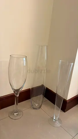 Set of 3 tall clear decorative glass vases (various shapes) 100,20,50 aed