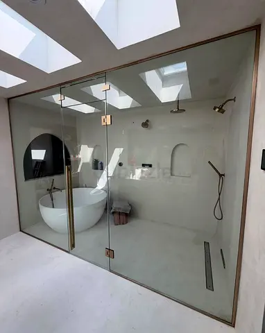 Frameless Glass Shower Enclosure with Brass Hinges and Double Shower Heads