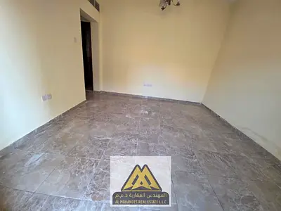 One bedroom and living room for annual rent in Al Rawda 1 - Ajman, with a very large area and a pri