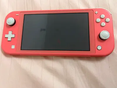Nintendo Switch Lite Coral - Good Condition, Ready to Use