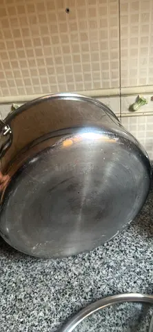 Stainless steel cooking pot with glass lid - used