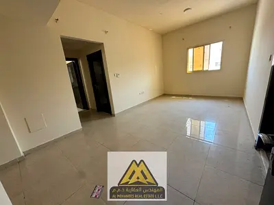 Spacious 1-bedroom apartment with a living room and 2 bathrooms; features central air conditioning.