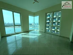FULL LAGOON VIEW TENANTED 2BR WITH PARKING FOR SALE