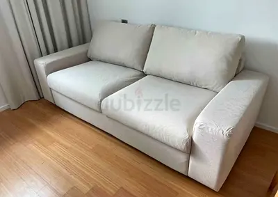 Light beige 2 seater sofa bed in good condition vimle