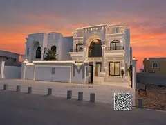 This dream villa in Ajman features a classic design. It is located close to all amenities and boasts