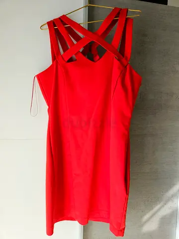 Red sleeveless women's dress with strappy back - good condition