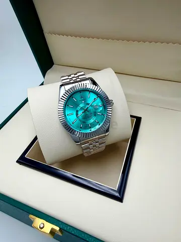 Men's Rolex official with turquoise dial, automatic