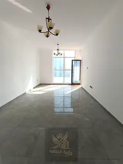For annual rent in Sharjah Al Majaz 2 first tenant two bedroom apartment with living room and two ba