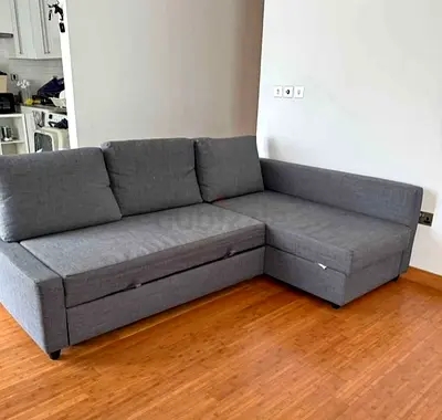 IKEA L shap Sofa store cum bed you can fix the storage lift or Right