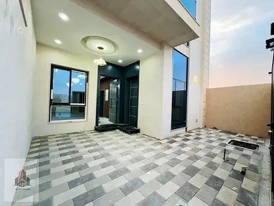 Villa for sale in Al Helio 2, Ajman | 5 master bedrooms, majlis, and living room | Registration fees included free hold