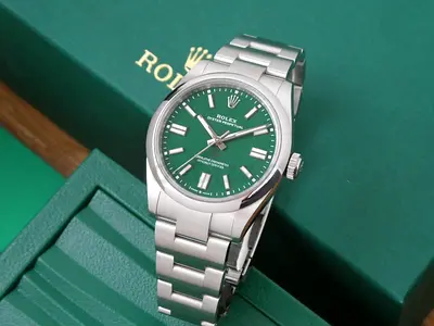 Rolex Oyster Perpetual Green Dial Stainless Steel Watch