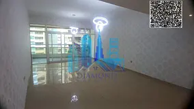 A two-bedroom apartment with a living room for sale in Horizon Towers, Ajman; it is currently leased