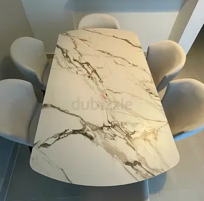 Dining table with ceramic top and 6 upholstered chairs