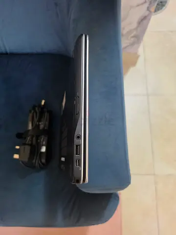 Used laptop with charger - slim profile, working condition