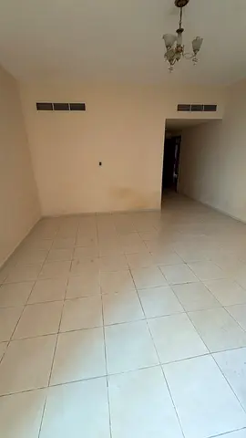 One-bedroom apartment with a living room—spacious layout—located at the Dubai exit.