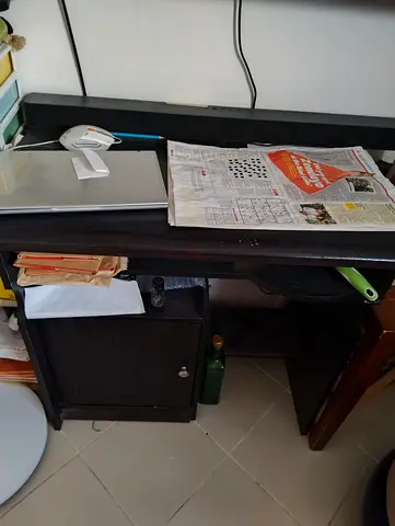 Compact dark wood study desk with storage cabinet