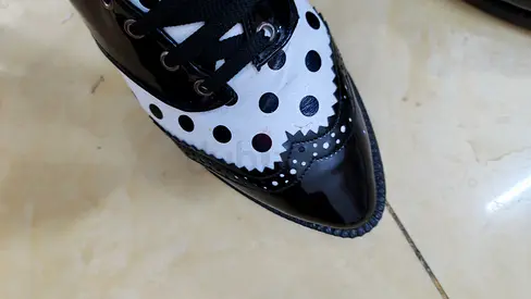Black and white polka dot leather brogues - size unknown, gently used