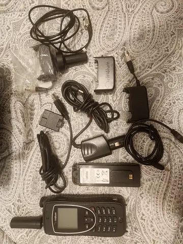Selling an authentic Iridium Extreme 9575 Satellite Phone with full accessory kit and a heavy-duty