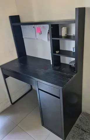 IKEA black desk with hutch and shelves — good condition